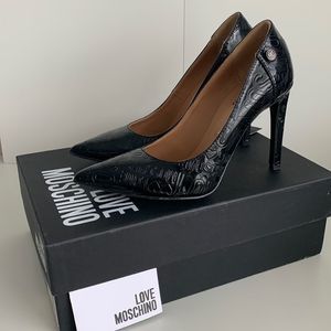 Love Moschino Black heel pumps etched exterior logo leather interior sz 38- 7.5